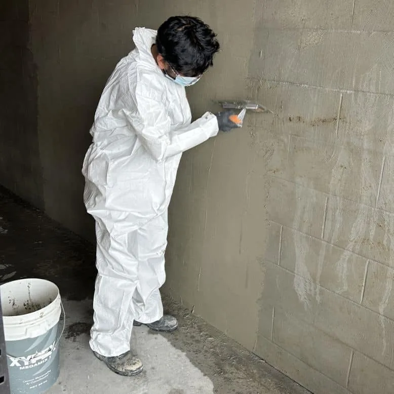 Specialist coating applied to masonry